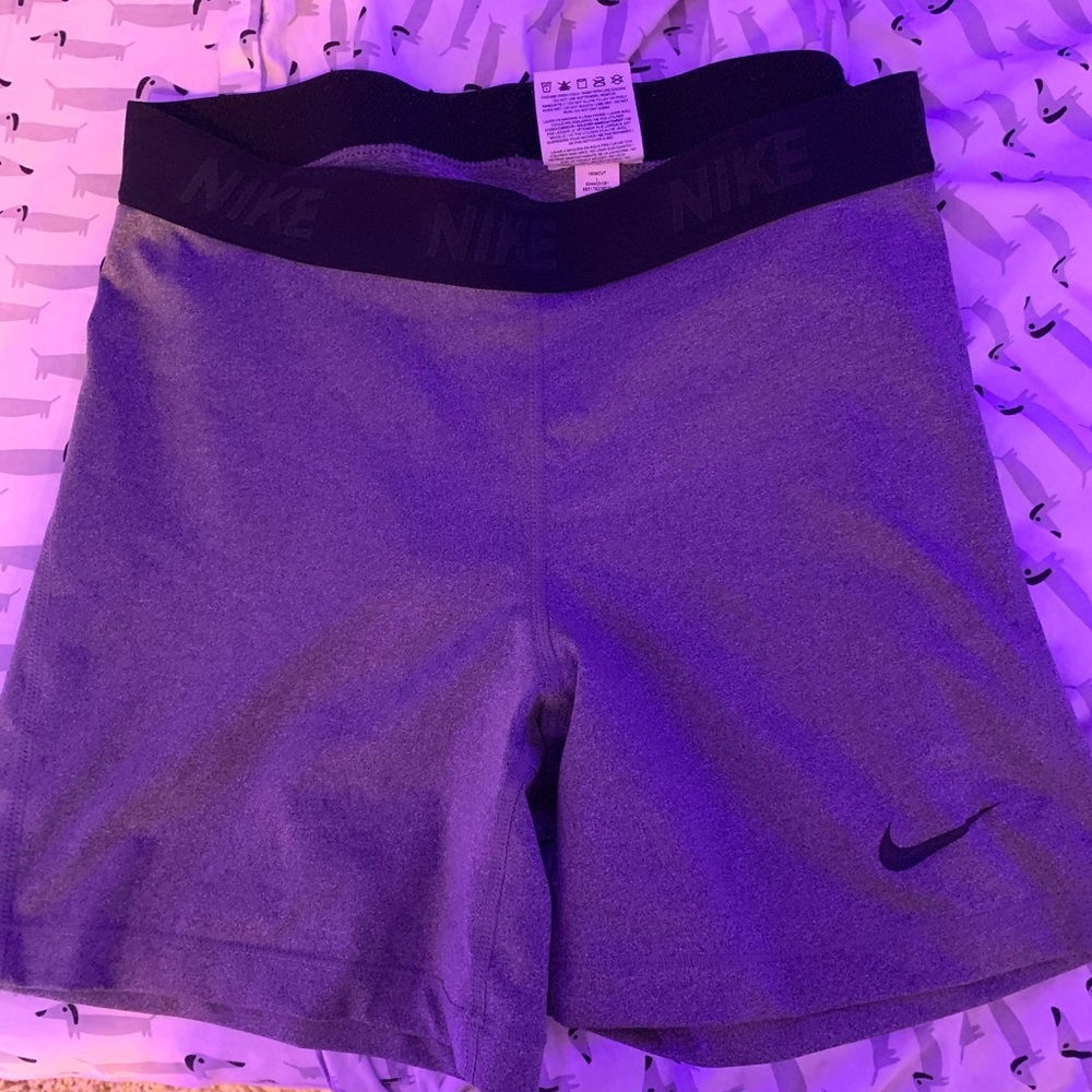Grey Nike compression shorts
